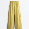 100% Linen Wide-Leg Trousers with Side Pleat 100% Linen Wide-Leg Trousers with Side Pleat