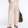 Wide-Leg Crop Trousers with Pleats and Stripes Wide-Leg Crop Trousers with Pleats and Stripes