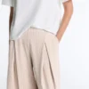 Wide-Leg Crop Trousers with Pleats and Stripes Wide-Leg Crop Trousers with Pleats and Stripes