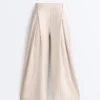 Wide-Leg Crop Trousers with Pleats and Stripes Wide-Leg Crop Trousers with Pleats and Stripes